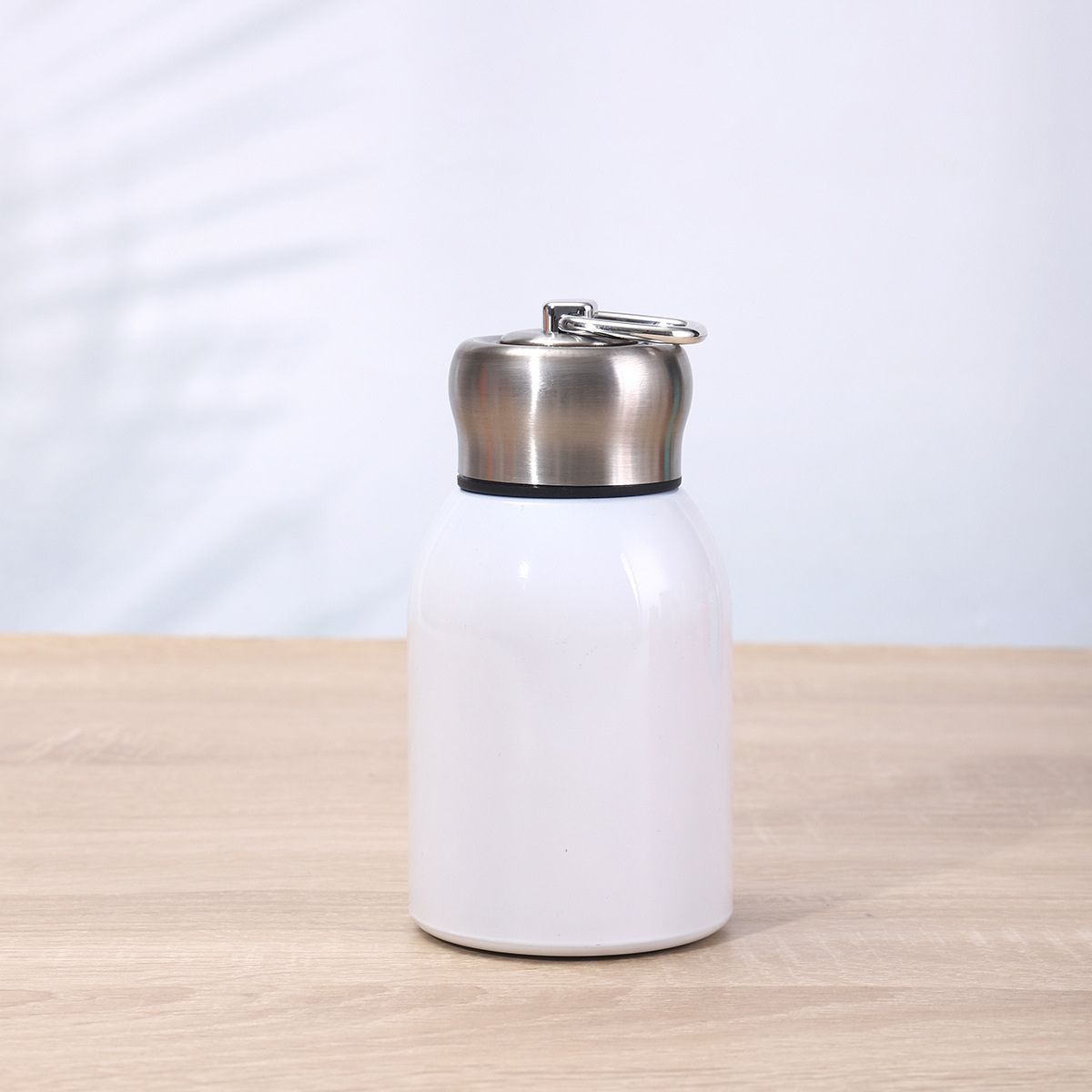 Custom mini thermos bottle made from recycled stainless steel for eco-friendly corporate gifts
