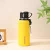 Yellow stainless steel thermos water bottle for events and giveaways