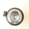 Inside view of thermos stainless steel bottle showing double-wall insulation