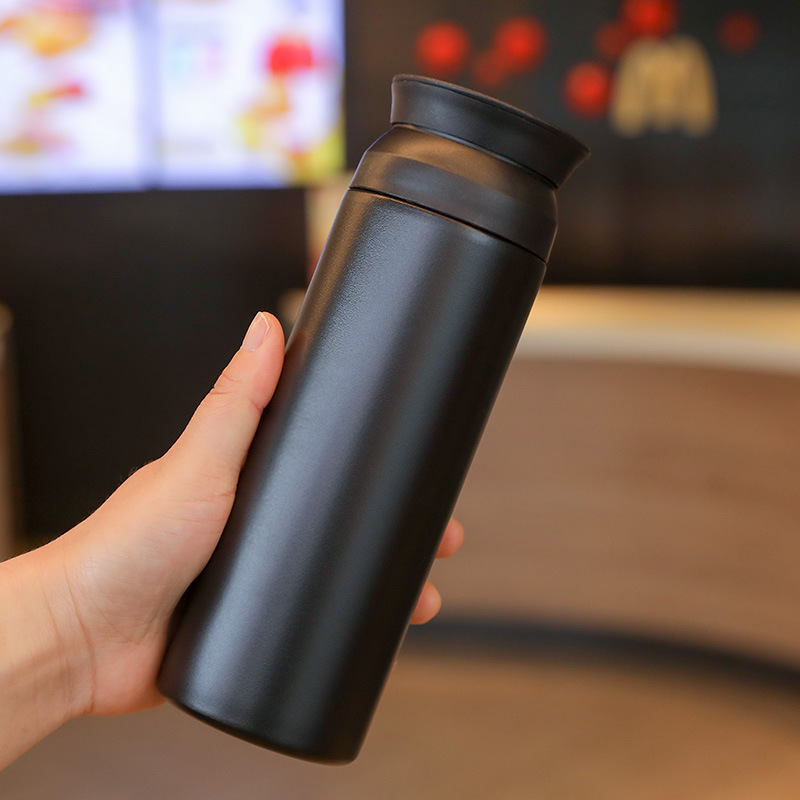 Stainless steel thermos water bottle in black with handle cap