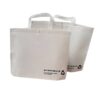 Non-woven bag with button or buckle closure