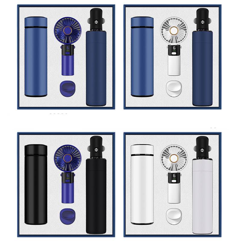 Corporate gift set with thermos bottle, hand fan, and umbrella
