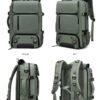 Travel backpack with rear luggage strap