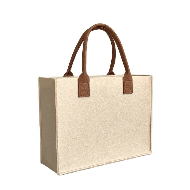 Felt tote bag filled with books and groceries