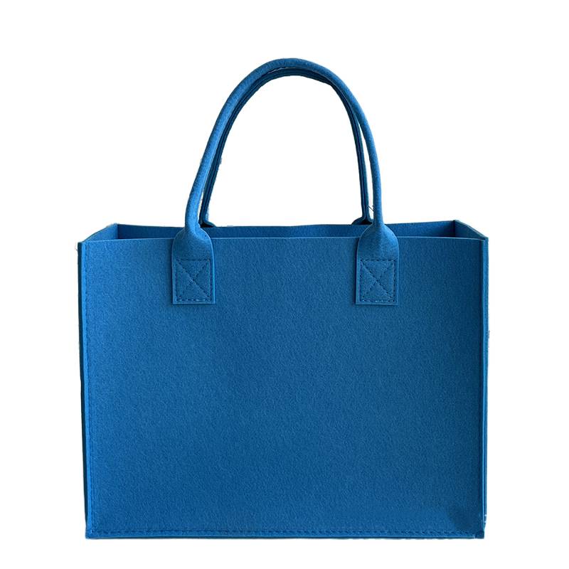 Royal blue felt tote bag with spacious interior