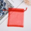 Red drawstring mesh pouch