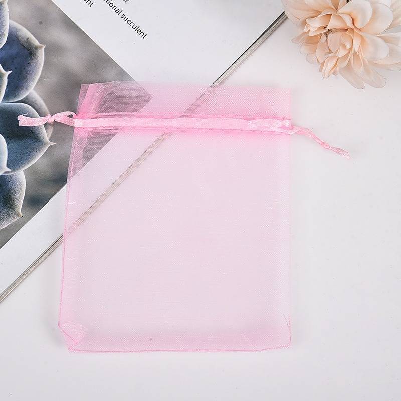 Pink drawstring mesh pouch