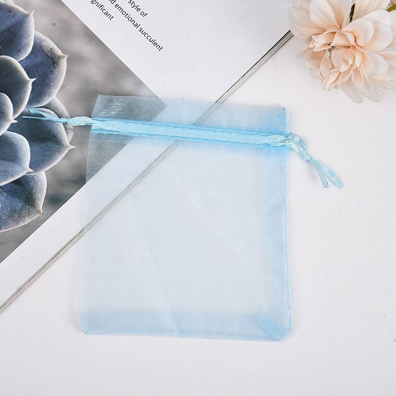 Light blue drawstring mesh pouch