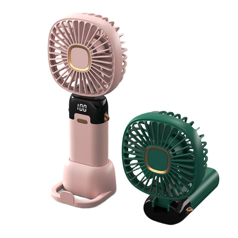 Handheld fan with integrated mobile phone holder