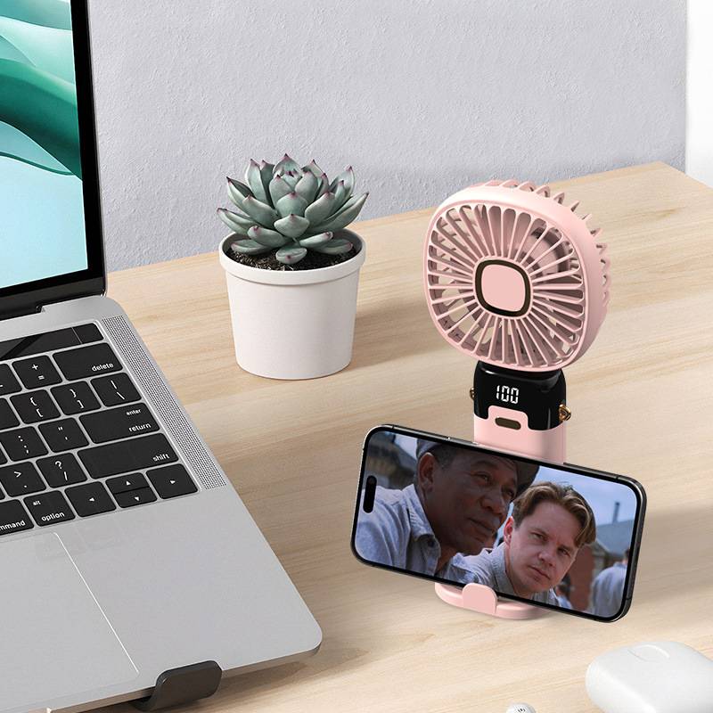 Handheld USB fan with built-in phone holder