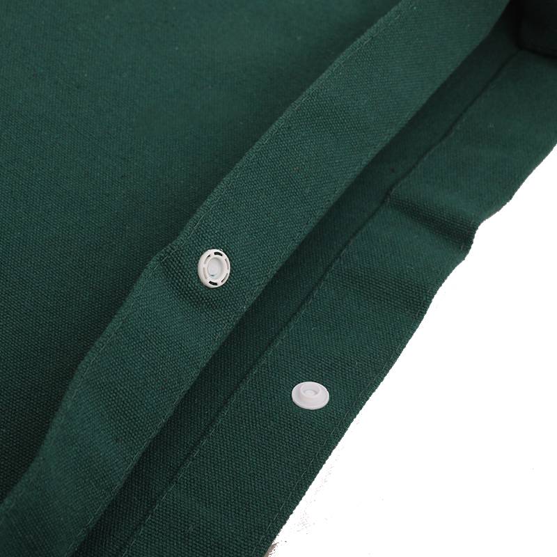 button closure on canvas sling bag